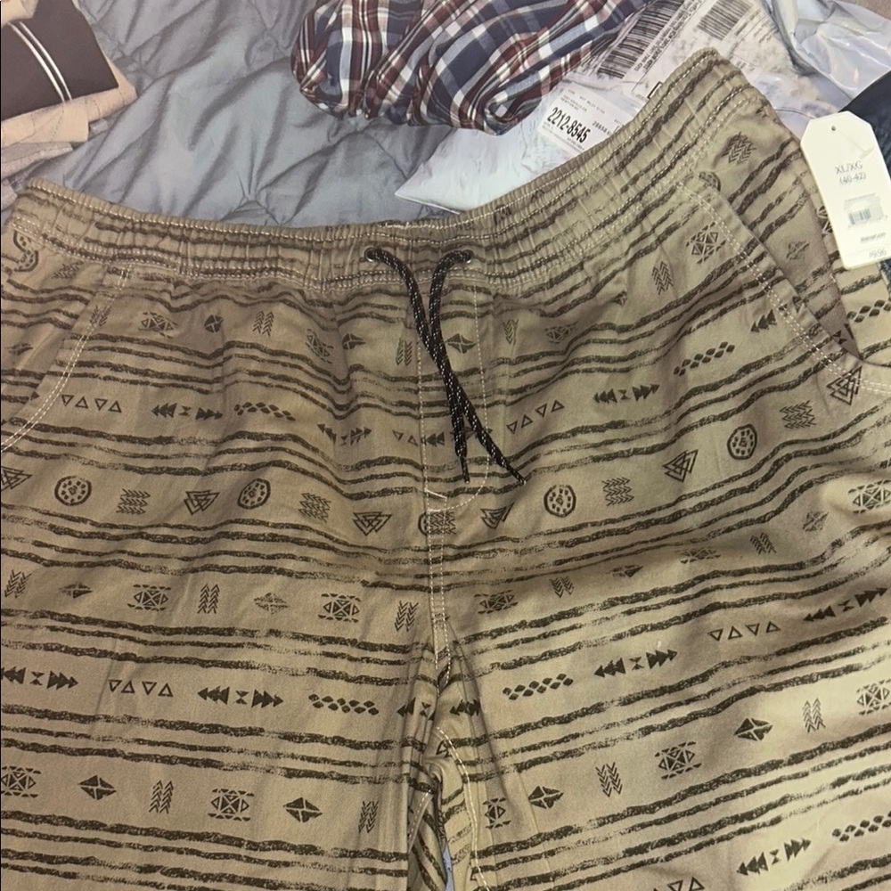 Faded Glory Patterned Tan and one blue shorts